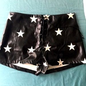Feaux leather lace up star shorts. Perfect for a Nashville trip! Never worn